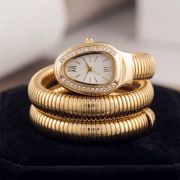 Gold crystal oval dial triple wrap bracelet watch for women