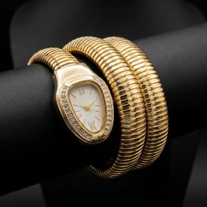 Gold crystal oval dial triple wrap bracelet watch for women